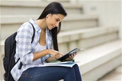 Student researching on tablet
