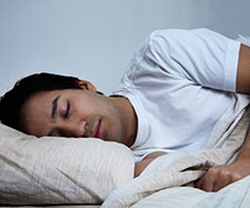 male is sleeping on his side